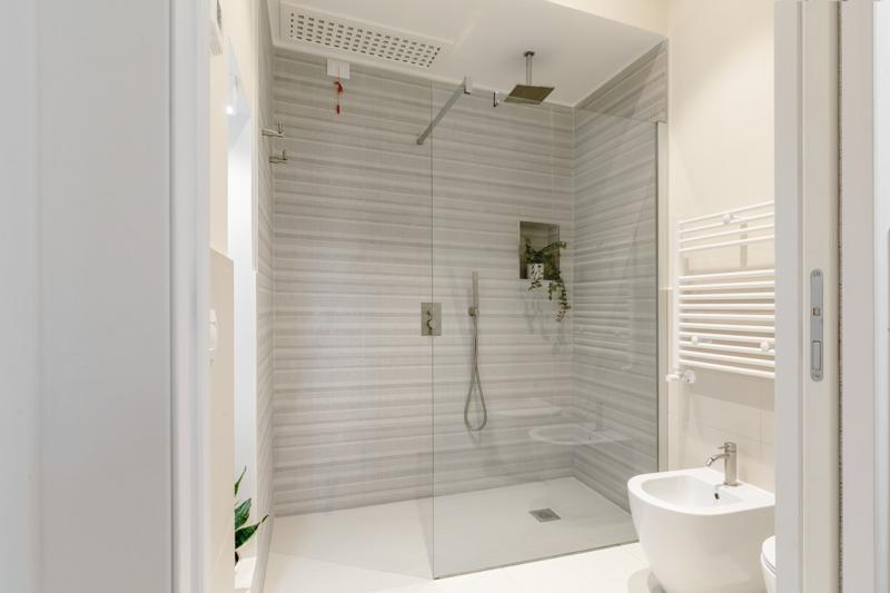 Bathroom with a large walk-in rain shower